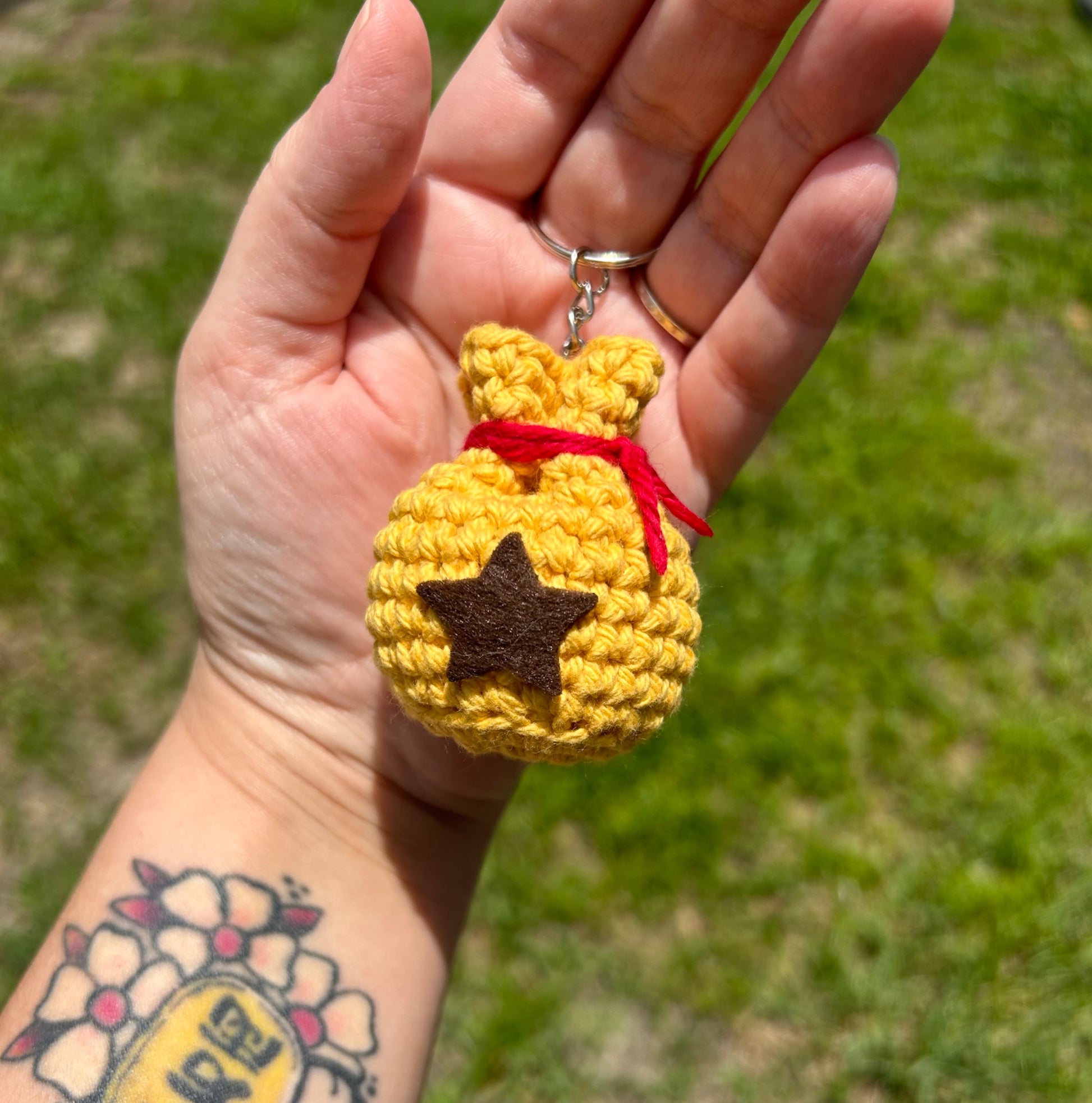 Nerdy Chick Creations - Yellow bell bag keychain - 1